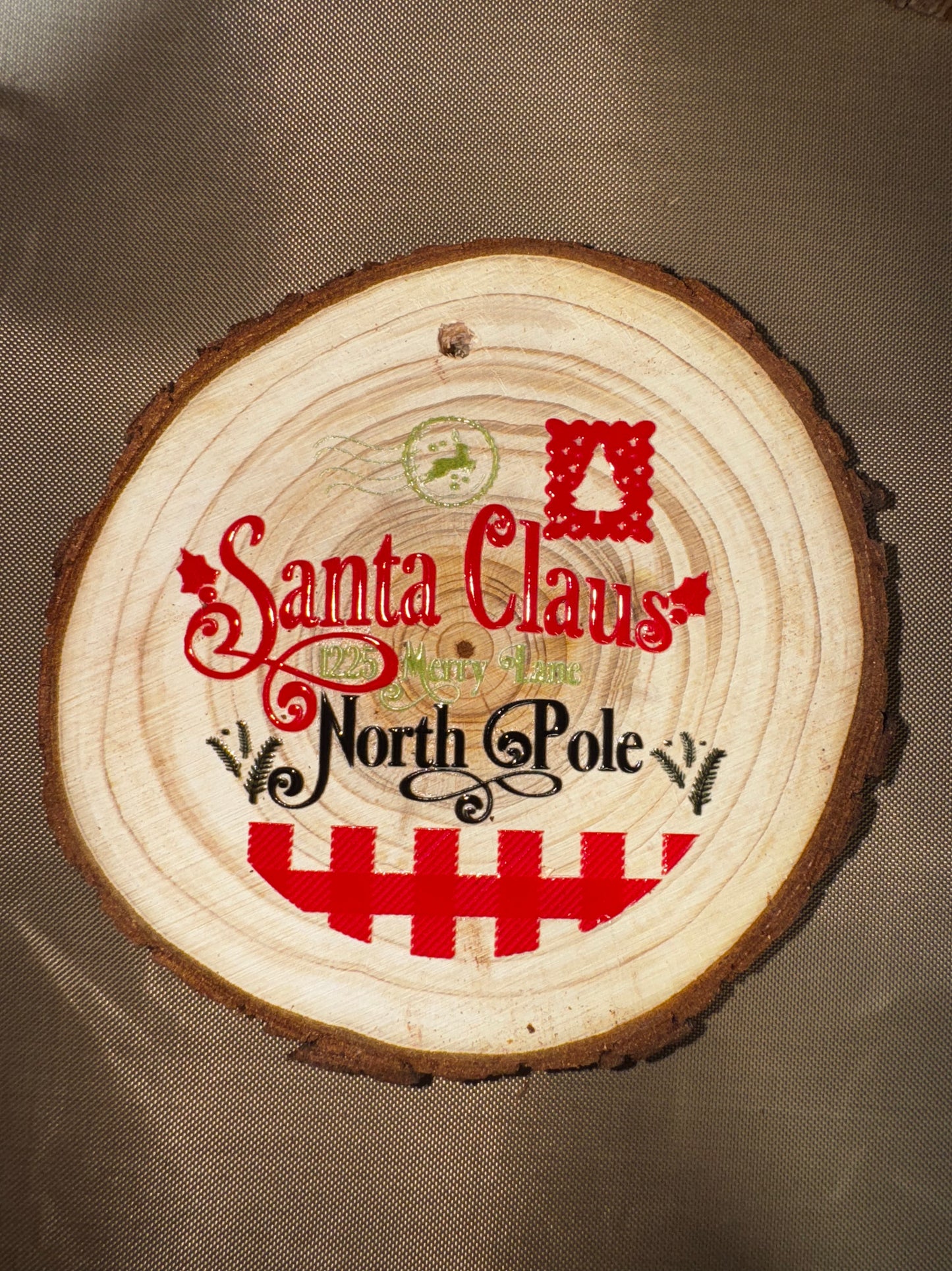 SANTA CLAUSE NORTH POLE ORNAMENT